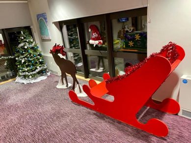christmas image of sleigh indoors